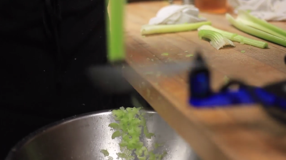 Drone slicing vegetables in the kitchen