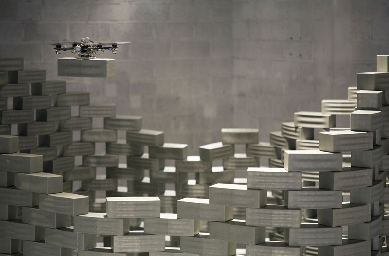 A quadcopter lays a brick in the correct position of the wall - (c) François Lauginie - Source