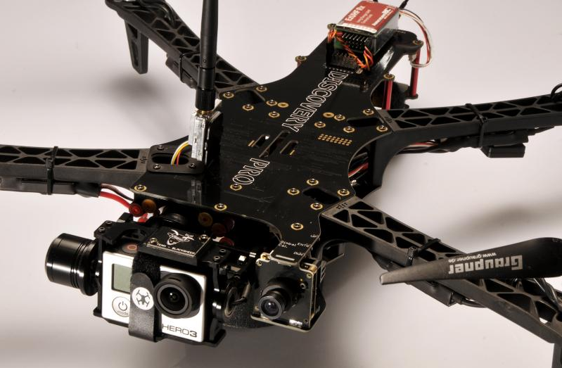 A TBS Discovery quadcopter with a board camera for FPV and a GoPro for video footage - Source
