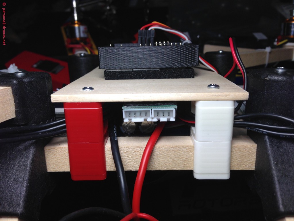 A detail of the power system and mounting of the flight controller on our Quadlugs build