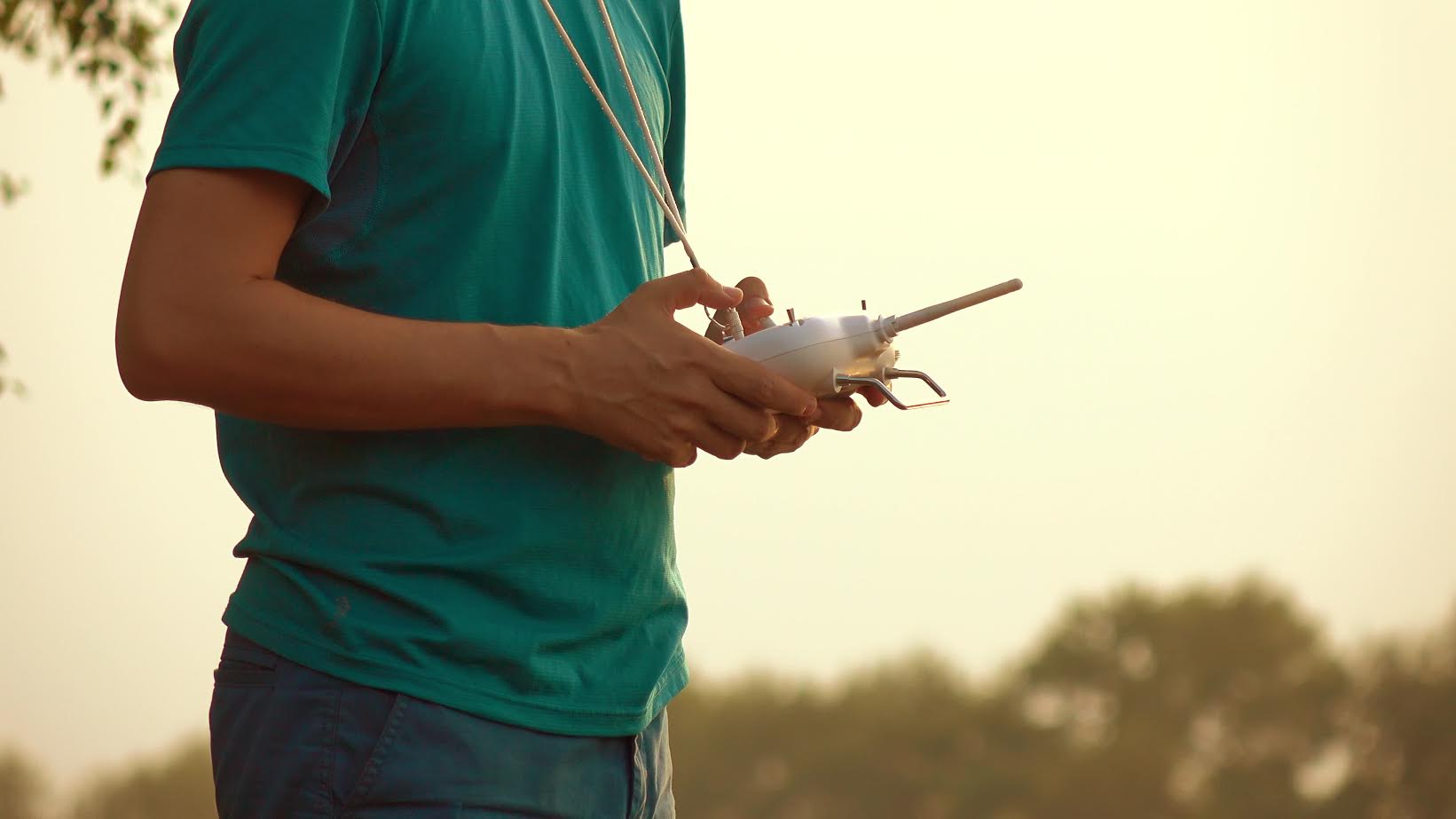 Man using drone RC remote